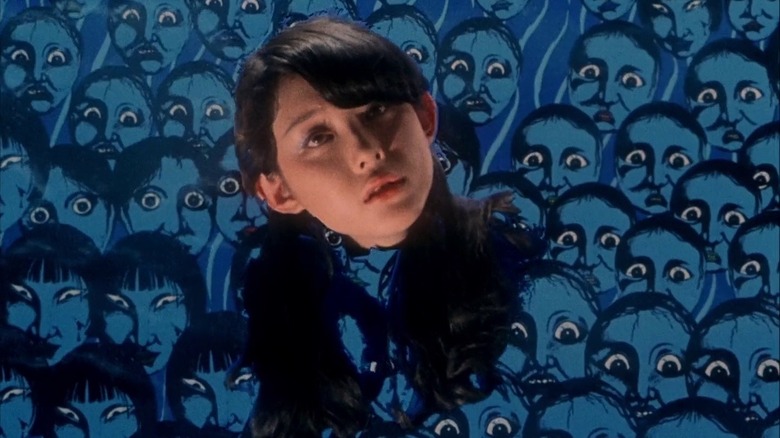Hausu House Obayashi Kimiko Ikegami surrounded by animated faces