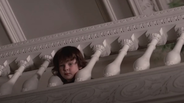 The Omen Damien peeks through rafters