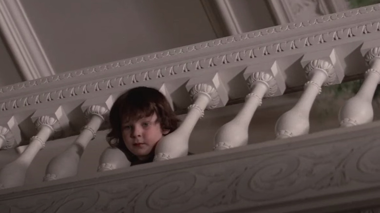 The Omen Damien peeks through rafters