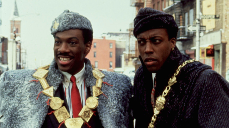 Eddie Murphy and Arsenio Hall wearing fur and gold