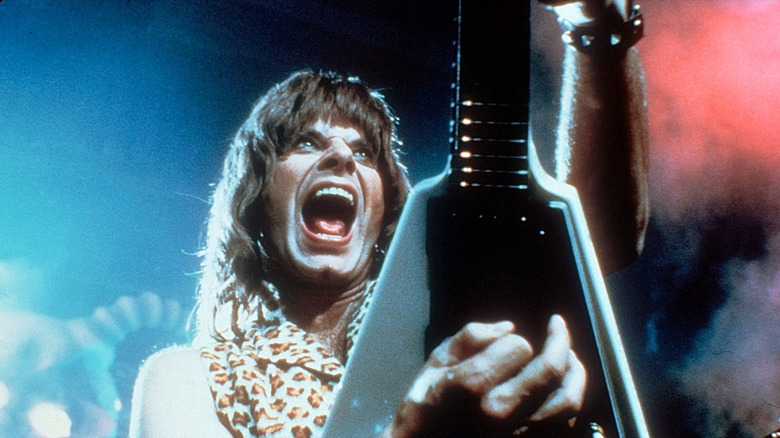 Nigel Tufnel playing the electric guitar