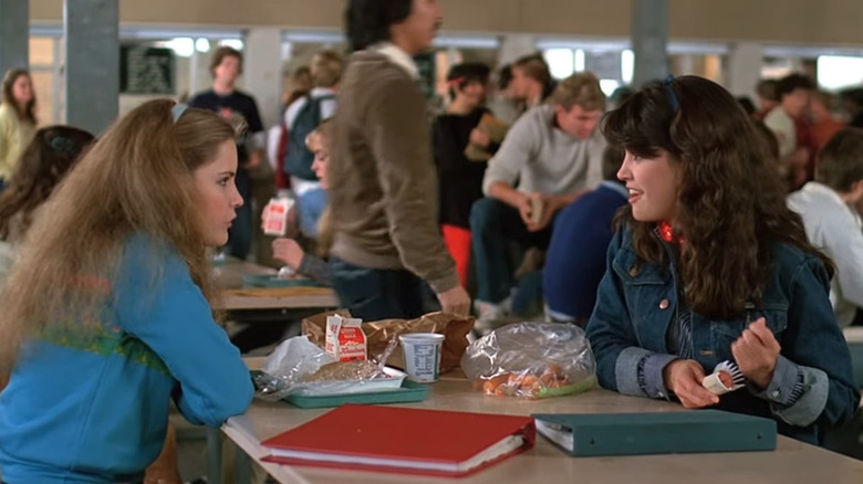 Stacy (Jennifer Jason Leigh) and Linda (Phoebe Cates) gossping at lunch in Fast Times at Ridgemont High