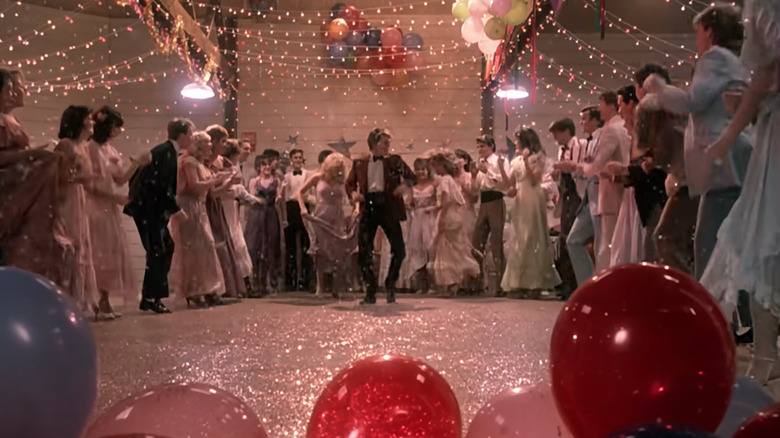 Ren (Kevin Bacon) dancing with classmates at prom in Footloose