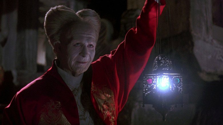 gary oldman bram stoker's dracula holds lantern
