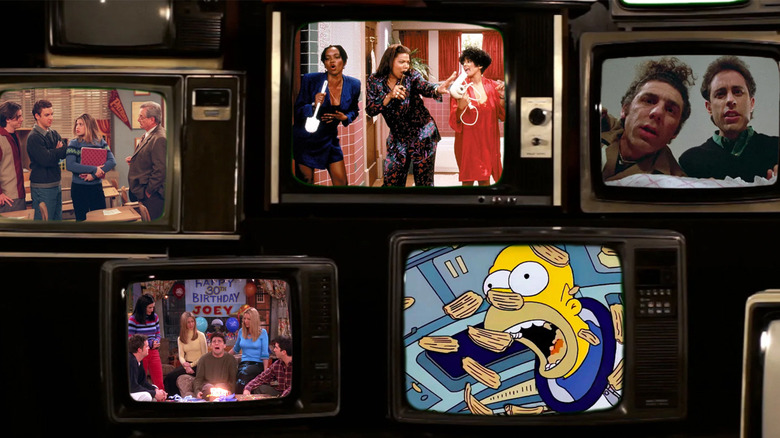 A stack of vintage TVs with images from Boy Meets World, Friends, Living Single, Seinfeld, and The Simpsons