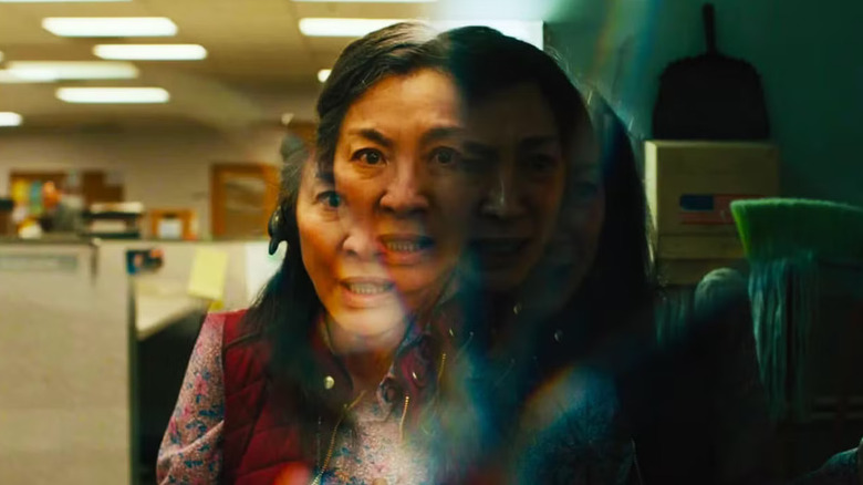 Evelyn Quan Wong (Michelle Yeoh) splits through the multiverse in Everything Everywhere All at Once