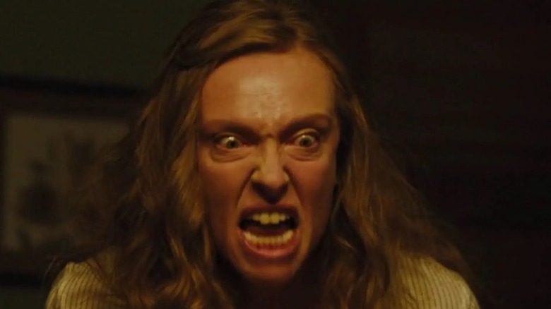 Annie Graham (Hereditary) screams at her family in Hereditary