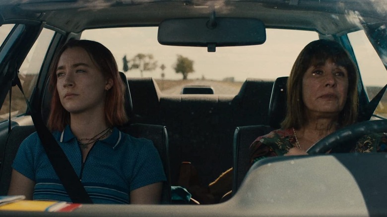 Lady Bird (Saoirse Ronan) and Marion McPherson (Laurie Metcalf) drive in the car in Lady Bird