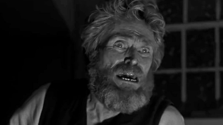 Thomas Wake (Willem Dafoe) delivers a speech in The Lighthouse