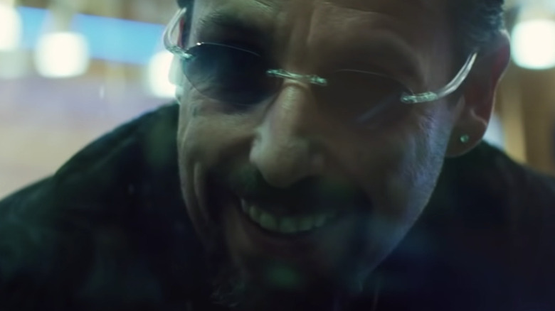 Howard Ratner (Adam Sandler) wears a skeevy grin in Uncut Gems