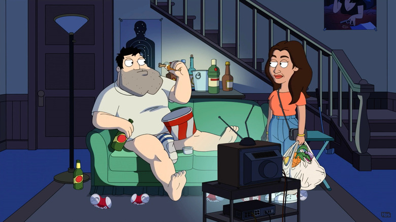 Stan eating on the couch while Radika watches him on American Dad!