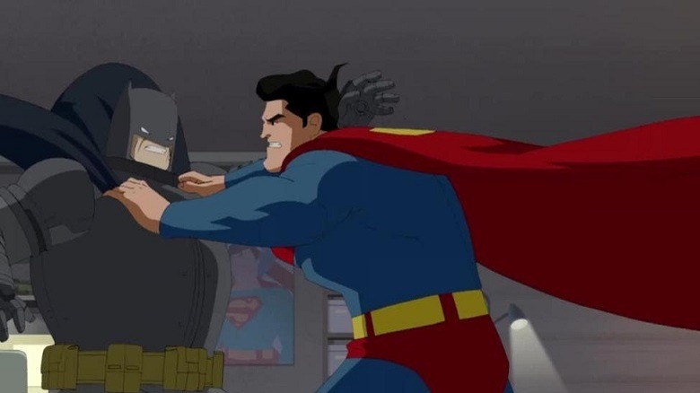 Superman wrestles with Batman