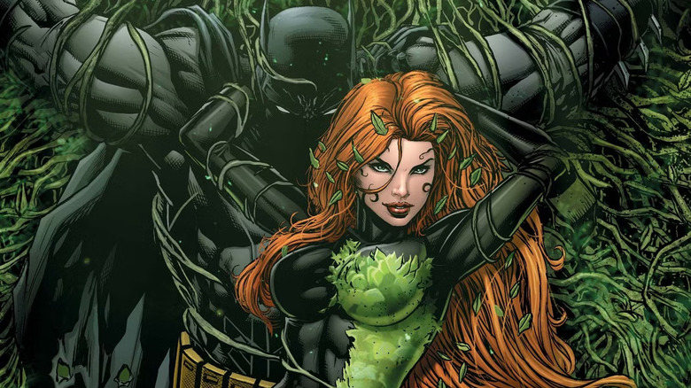 Poison Ivy stands next to a captive Batman in Batman: Detective Comics