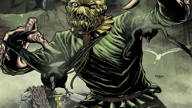 Scarecrow reaches out in a creepy way