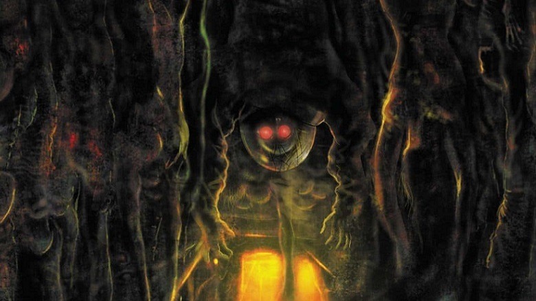 Mr. Freeze hangs upside down in Killer Croc's Lair