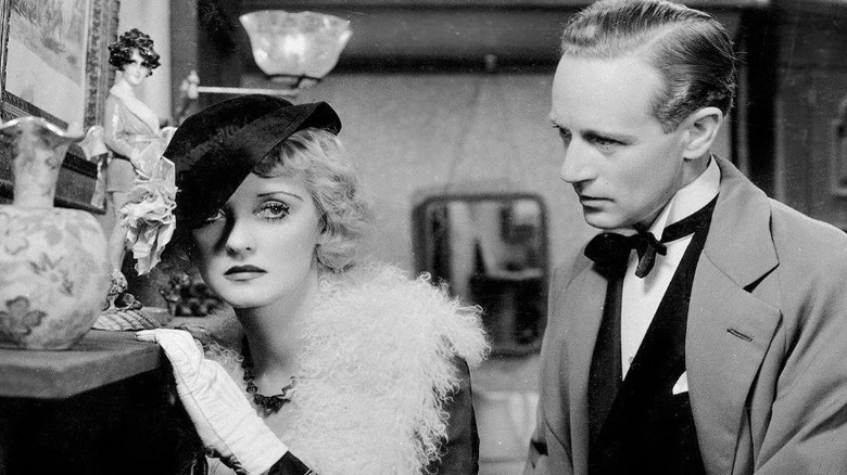 Bette Davis leaning sadly