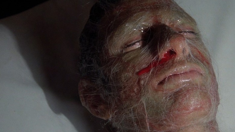 Web-covered man's nose bleeds