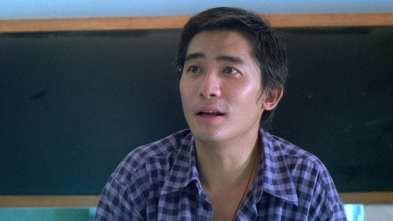 Tony Leung as Cop 663 wearing casual clothes in Chungking Express