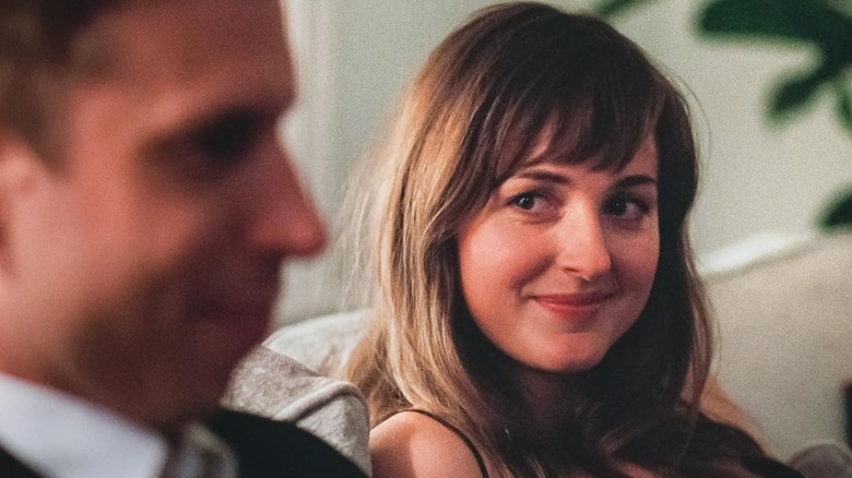 Renate Reinsve as Julie smiling at Herbert Nordrum as Eivind in The Worst Person in the World