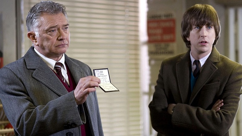 George Gently (Martin Shaw) shows his credentials next to John Bacchus (Lee Ingleby) in Inspector George Gently