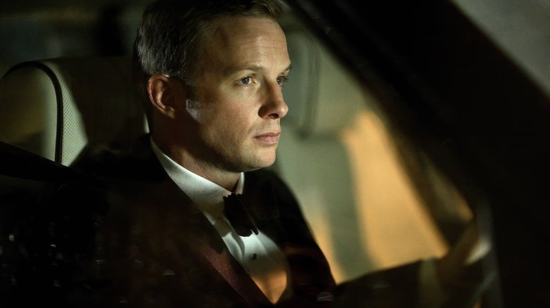 Joseph Chandler (Rupert Penry-Jones) sits in a car while wearing a tuxedo in Whitechapel