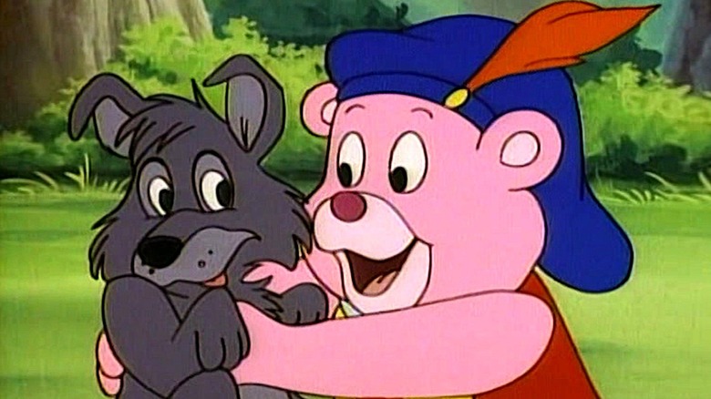 Cubbi Gummi holding a wolf pup in Adventures of the Gummi Bears