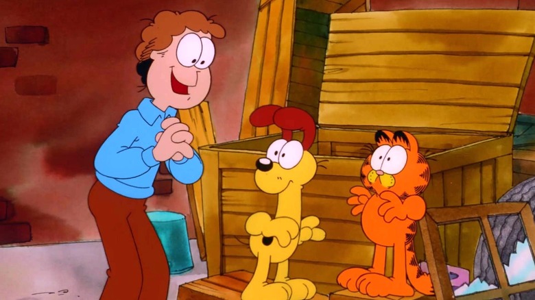 Jon Arbuckle speaking to Odie and Garfield in Garfield and Friends