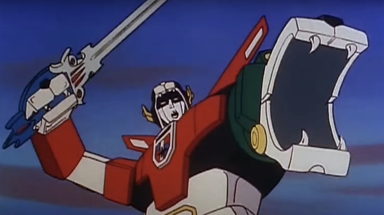 Voltron raising a sword for battle in Voltron: Defender of the Universe