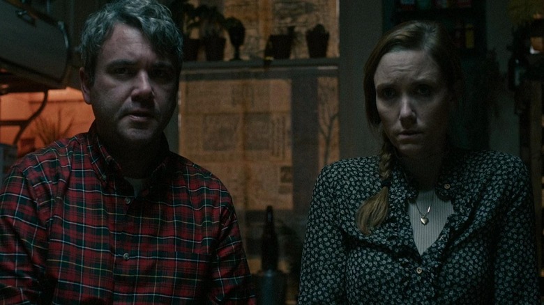 Matt and Sarah sit looking frightened
