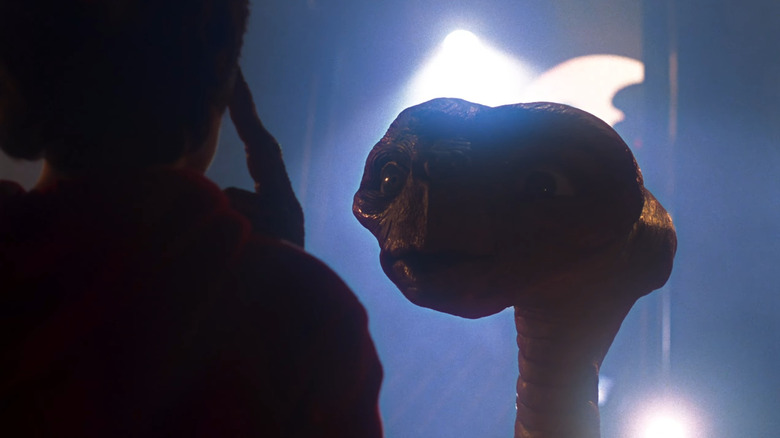E.T. raising his finger in E.T. The Extra Terrestrial