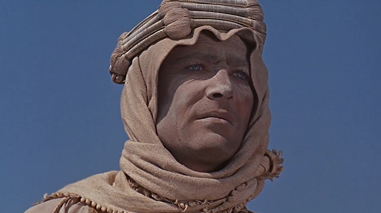 Peter O'Toole as T.E. Lawrence covered in sand in Lawrence of Arabia