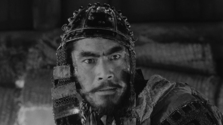 Kikuchiyo (Toshiro Mifune) wears armor in Seven Samurai