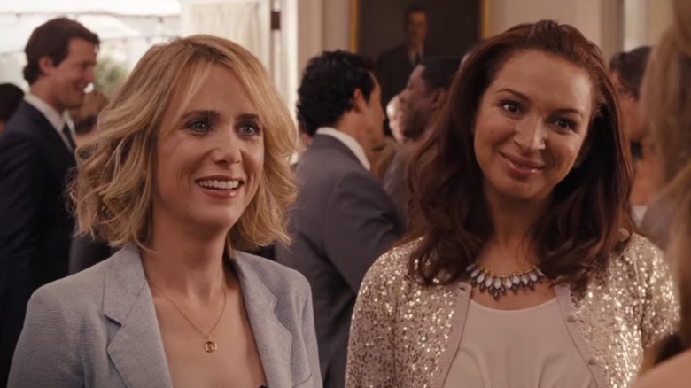 Kristen Wiig as Annie Walker laughs next to Maya Rudolph as Lillian Donovan in Bridesmaids