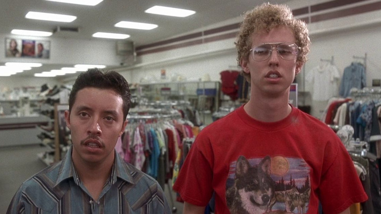 Jon Heder as Napoleon and Effren Ramirez as Pedro look at a suit in a thrift shop in Napoleon Dynamite