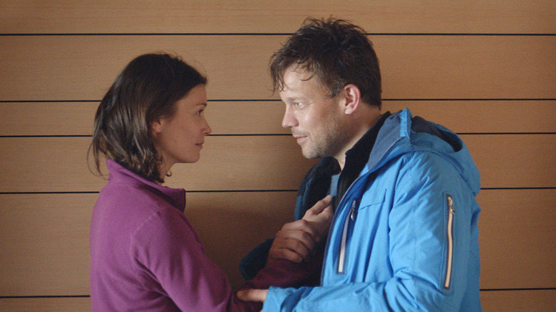 Ebba (Lisa Loven Kongsli) and Tomas (Johannes Bah Kuhnke) consider each other in Force Majeure
