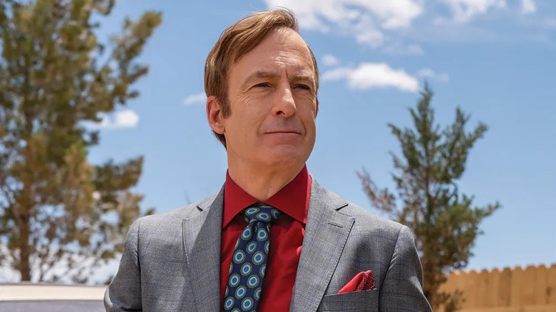 Saul Goodman smirks outside in Better Call Saul