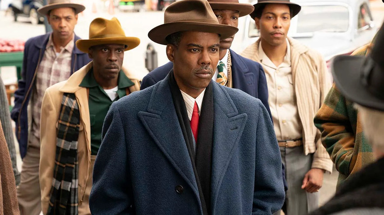 Loy Cannon (Chris Rock) sternly leads his crew on the street in Fargo