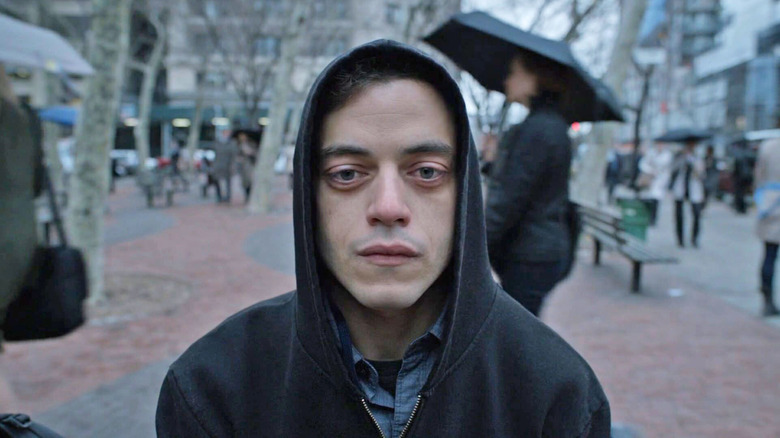 Rami Malek as Elliot Alderson, staring blankly on Mr. Robot