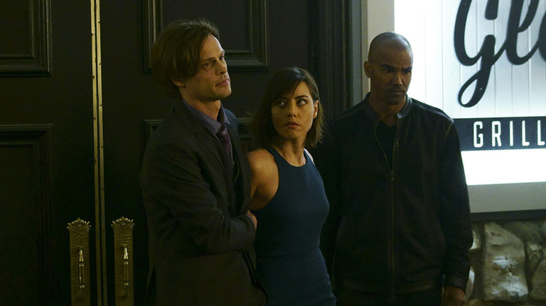 Matthew Gray Gubler, Aubrey Plaza, and Shemar Moore as Spencer Reid, Cat Adams, and Derek Morgan, walking out of a restaurant on Criminal Minds