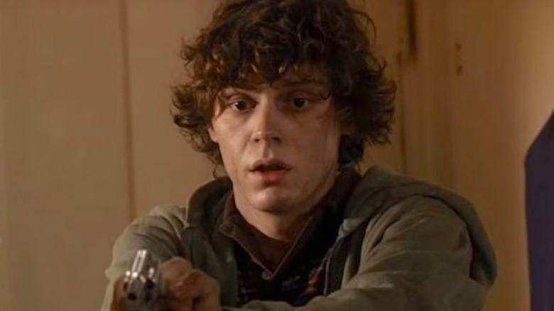 Evan Peters as Charlie Hillridge, aiming a gun on Criminal Minds