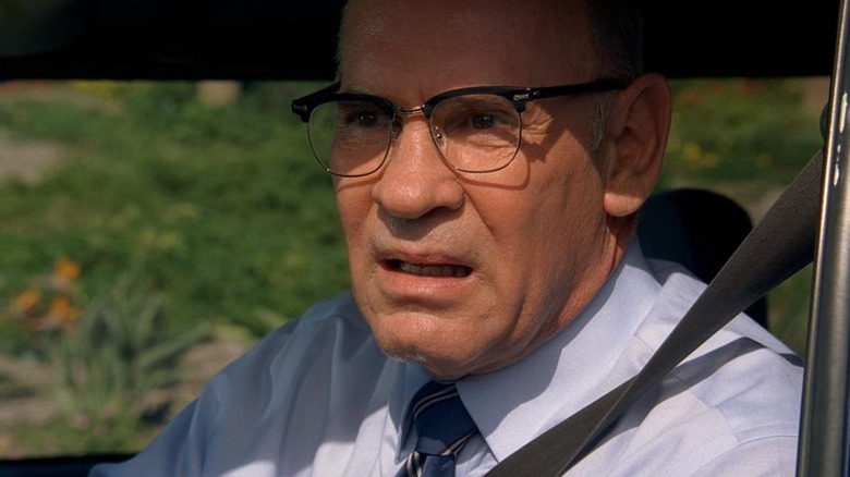 Mitch Pileggi as Norman Hill, driving a car on Criminal Minds