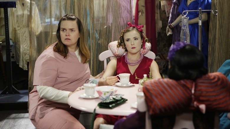 Jennifer Hasty as Samantha Malcolm, having a tea party with human dolls on Criminal Minds