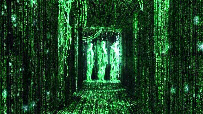 Agents in a hallway, all overlaid by the green code of The Matrix