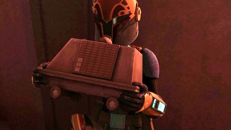 Sabine Wren inspects a mouse droid