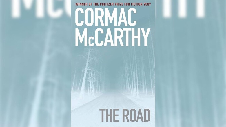 Desolate woods on cover of The Road by Cormac McCarthy