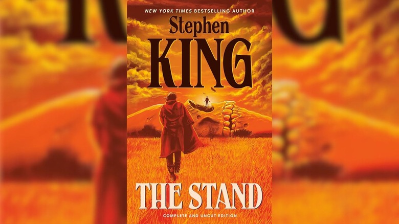 Person walking toward another on cover of The Stand by Stephen King