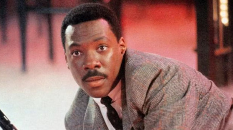 Eddie Murphy as Reggie, in a shootout in 48 Hrs