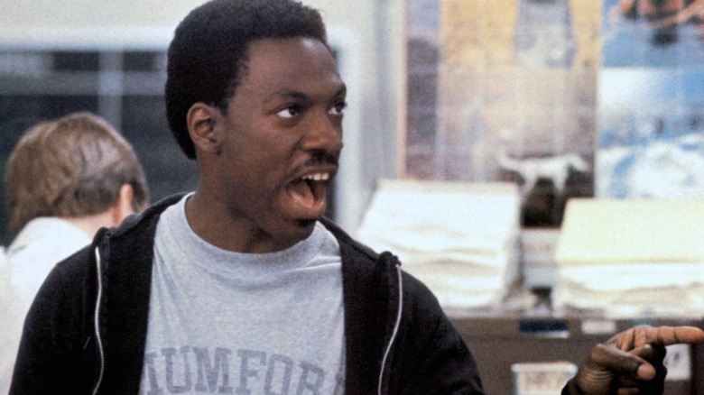Eddie Murphy as Axel Foley, pointing and shouting in Beverly Hills Cop