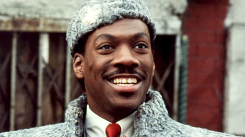 Eddie Murphy as Akeem, thrilled to be in Queens in Coming to America
