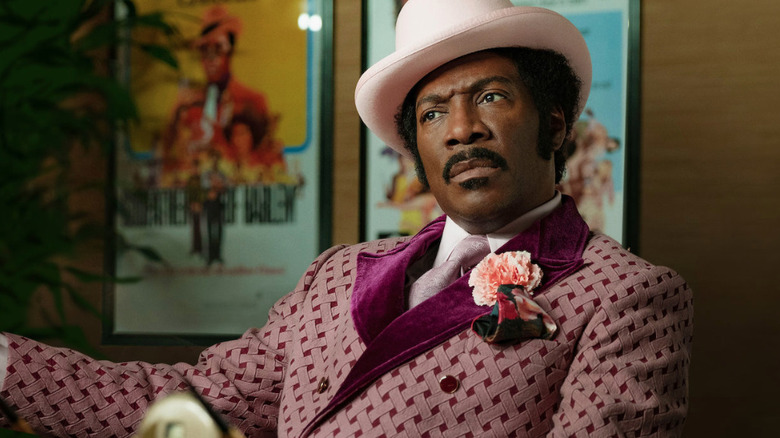 Eddie Murphy as Rudy, not liking what he's hearing in Dolemite Is My Name